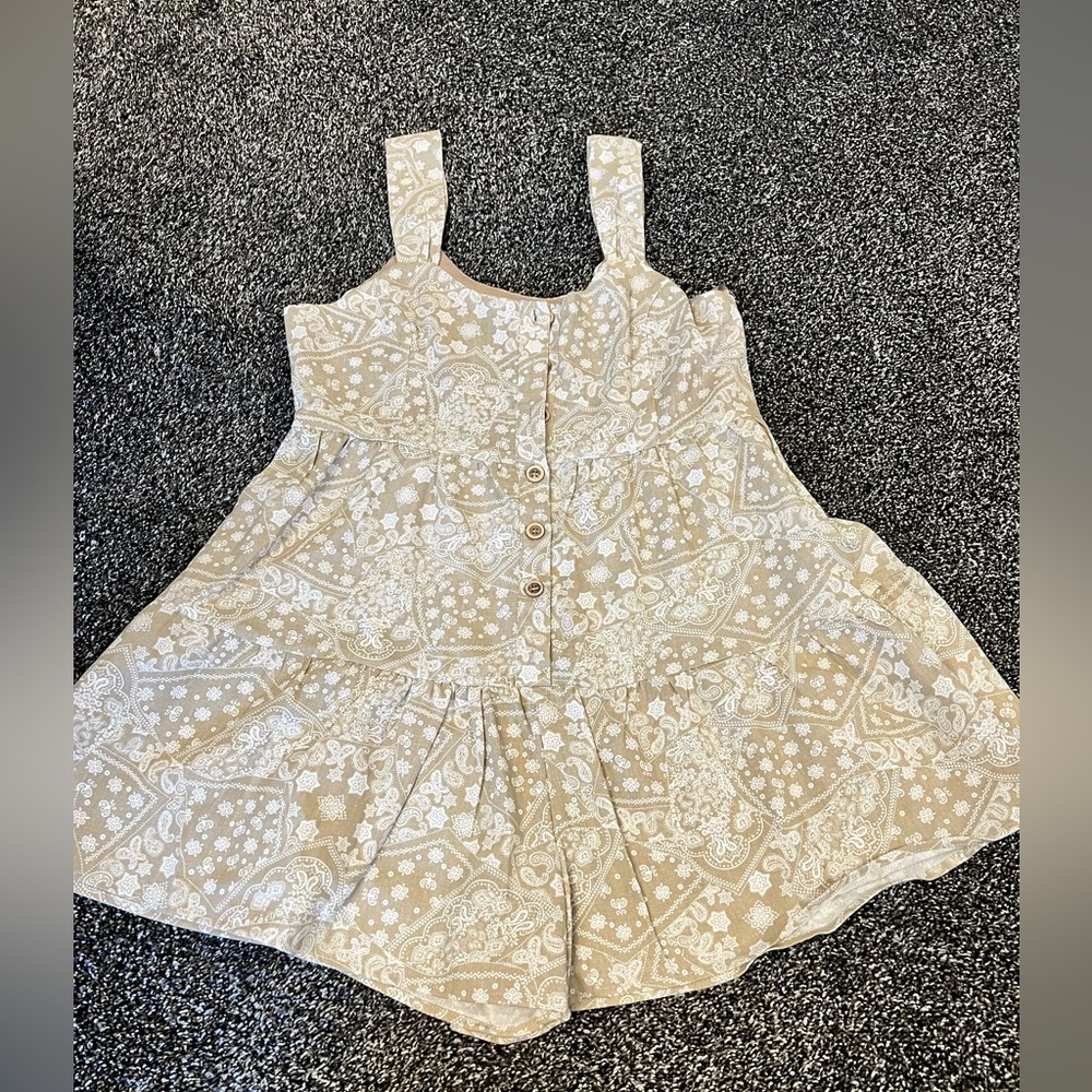Romper size Medium from the boutique The Post - brand new without tags